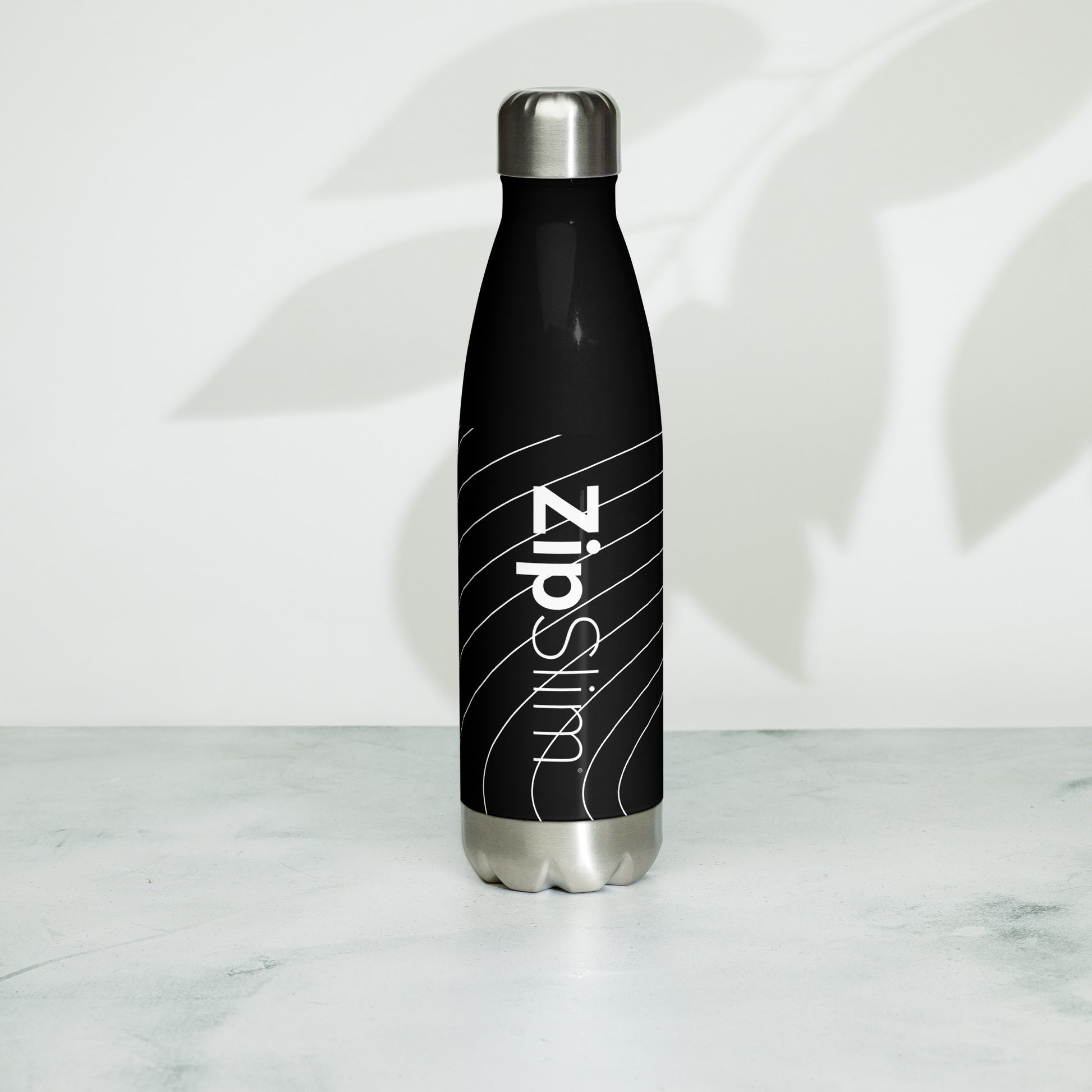 https://beyondslimstore.com/cdn/shop/products/stainless-steel-water-bottle-black-17oz-left-6410f4fe3e8b7.jpg?v=1678836337&width=1946